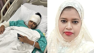 Injured woman with head bandage lying in hospital bed holding a mobile phone.