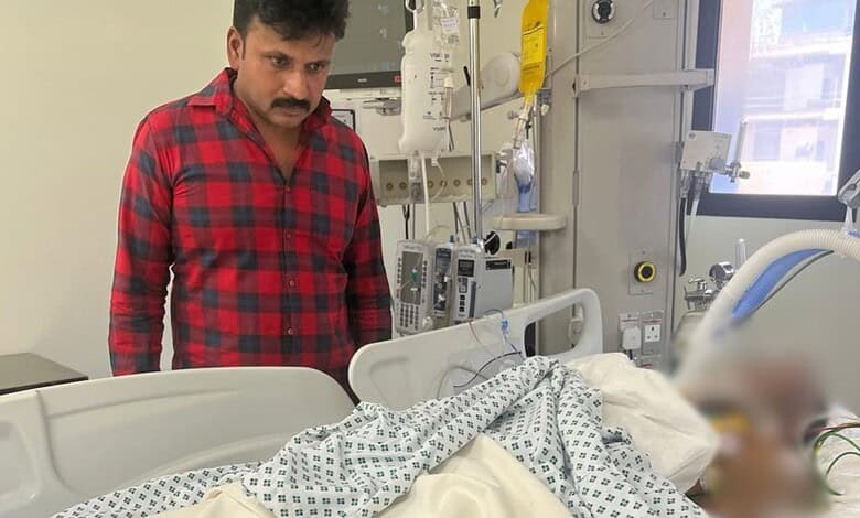 Indian man in hospital with medical equipment after accident in Saudi Arabia.