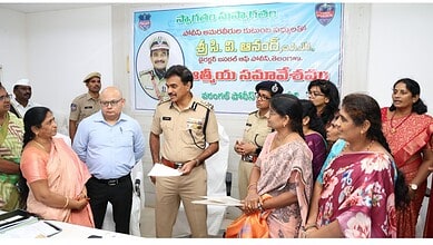 Police officials and women gather at a ceremony for TG-VEER scheme launch in Telangana.