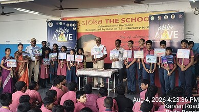 Students and police officers participate in a road safety awareness session at The Siasat Daily event.