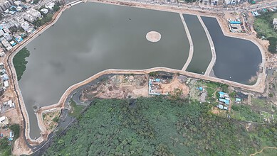 Uppal Nalla Cheruvu lake restored and filled with water during monsoon season in Hyderabad.