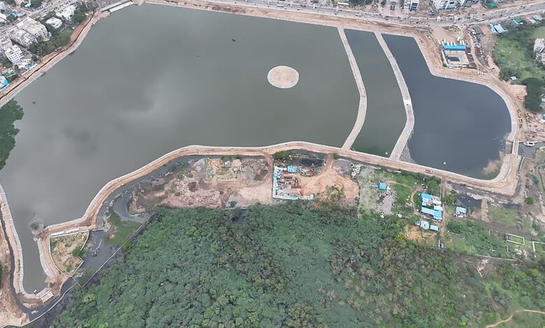 Uppal Nalla Cheruvu lake restored and filled with water during monsoon season in Hyderabad.