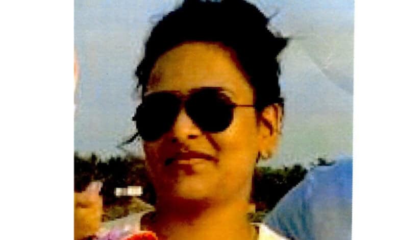 A photo of Vishakha Rathod wearing dark sunglasses and a white top outdoors.