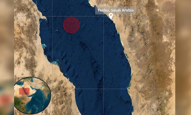 Tanker on fire off Saudi Arabia after projectile strike, with visible flames and smoke.