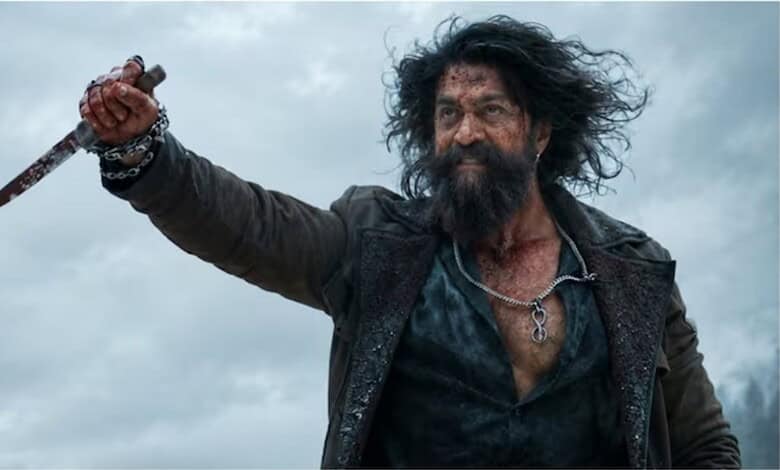 A rugged man with wild hair and beard holding a dagger, set against a cloudy sky.