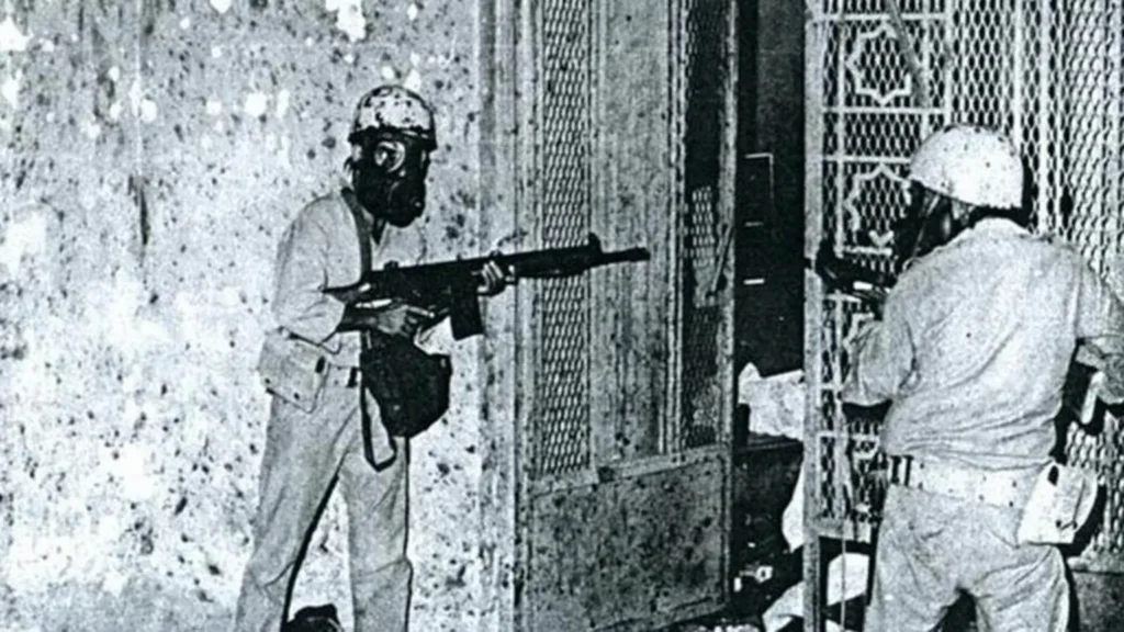 Saudi soldiers enter a Grand Mosque corridor during the 1979 siege.