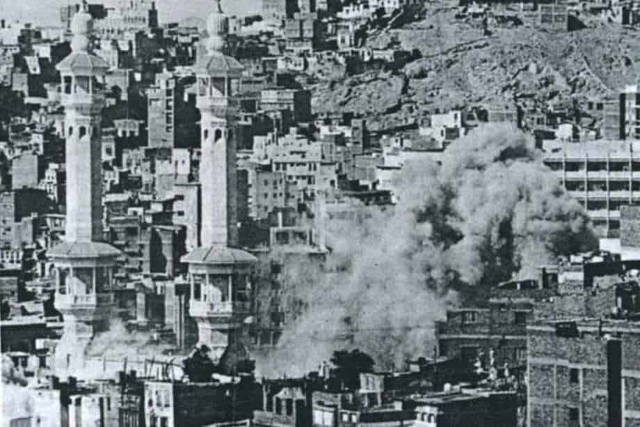 Smoke rises over Makkah during the 1979 Grand Mosque siege.
