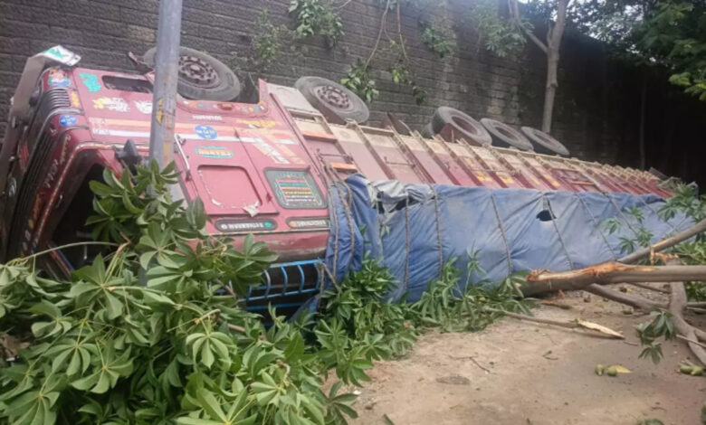 Lorry carrying cement bags falls from ORR in Shamshabad