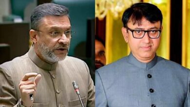 Amjed Ullah Khan and Akbaruddin Owaisi during a political discussion or speech.