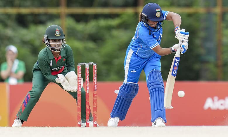 Indian female cricketer batting against Bangladesh in a cricket match at the Asian Games.