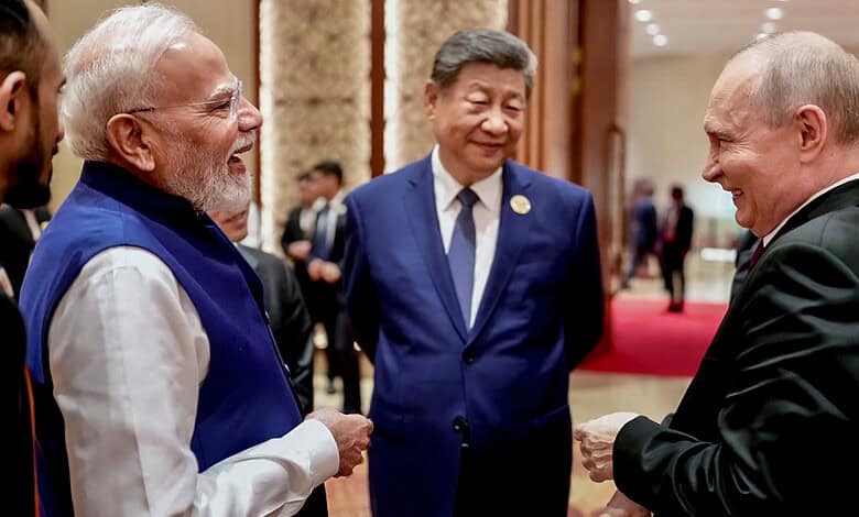 Prime Minister Narendra Modi with Russian President Vladimir Putin and Chinese President Xi Jinping on the sidelines of the 18th BRICS Summit, in New Delhi. (Source: PTI)