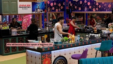 Contestants in the Bigg Boss 20 house kitchen during a task or activity.