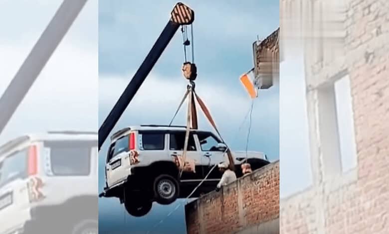 Set for travel abroad, Bihar man parks SUV on terrace with crane