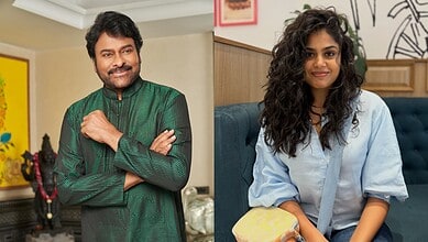 Chiranjeevi and Faria Abdullah seated indoors, smiling at the camera.