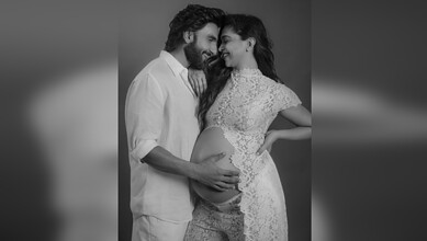 Deepika Padukone and Ranveer Singh with her pregnant belly, smiling and embracing each other.