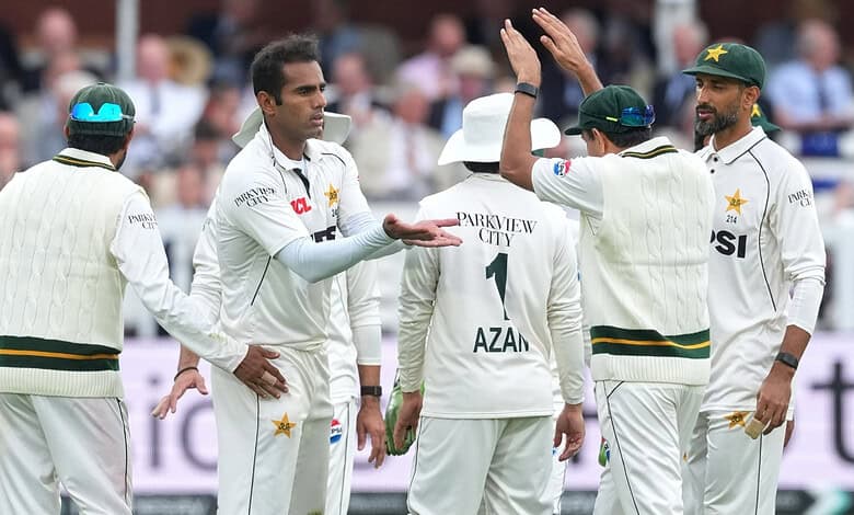 Pakistani cricket team players on the field during a match at Lord's.