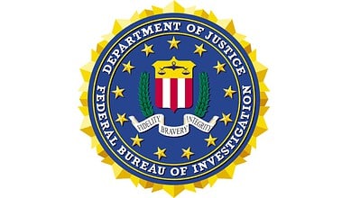 Official FBI seal featuring shield, stars, and motto, representing the Federal Bureau of Investigation.