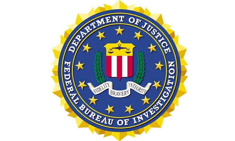 Official FBI seal featuring shield, stars, and motto, representing the Federal Bureau of Investigation.