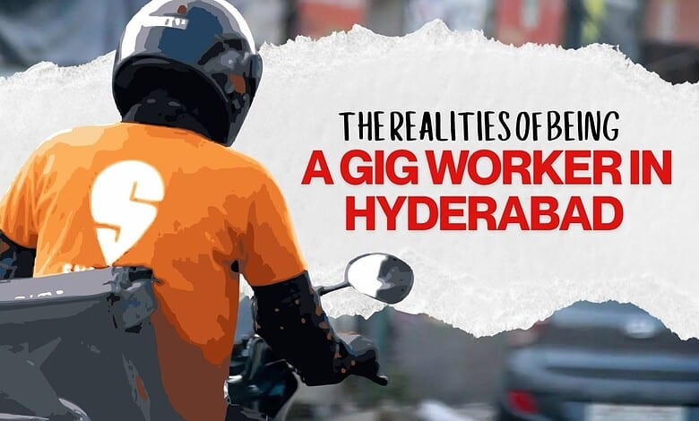 Gig worker in Hyderabad riding a motorcycle with a helmet and orange shirt.