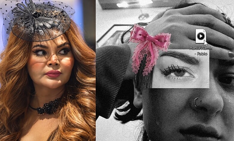 Rakhi Sawant in a stylish black hat and makeup, looking to the side with a confident expression.