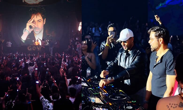 Emraan Hashmi DJing at Hyderabad event with crowd and large screen behind him.