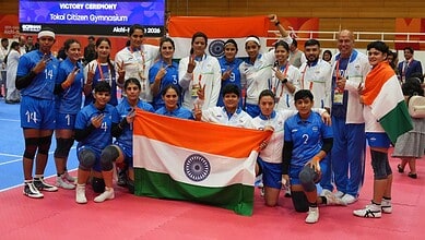 Indian women's kabaddi team celebrating their gold medal victory at the Asian Games.