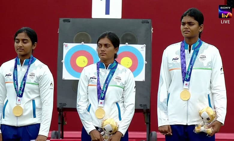 Indian women's archery team wins gold at Asian Games with medals and teddy bears.