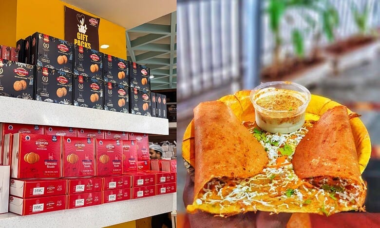 Hyderabadi snacks and sweets displayed on store shelves with a plate of samosas and chutney.