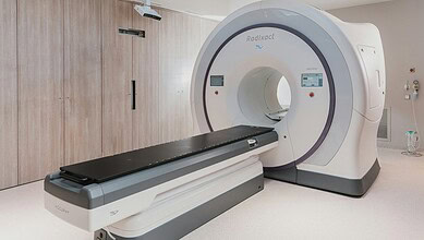 State-of-the-art MRI scanner in a clean hospital setting for medical imaging.