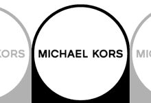 Michael Kors logo displayed on a store sign at GVK Mall in Hyderabad.