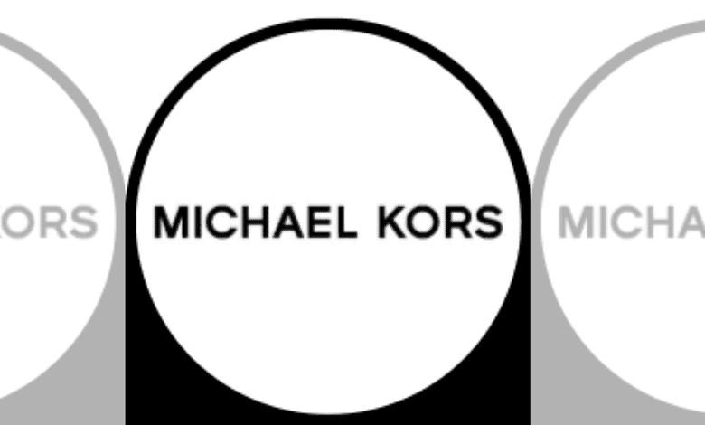 Michael Kors logo displayed on a store sign at GVK Mall in Hyderabad.