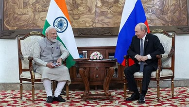 Indian Prime Minister Narendra Modi and Russian President Vladimir Putin in a formal meeting.
