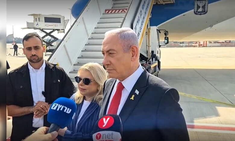 Israeli Prime Minister Benjamin Netanyahu speaks to the media upon arrival at the airport.