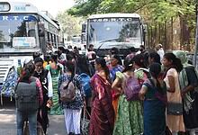 Passengers getting into a TGSRTC bus (Image credit: Telangana Today)