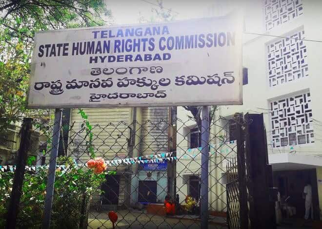Signboard of Telangana State Human Rights Commission Hyderabad in English and Telugu.