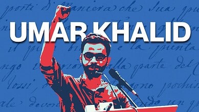 Umar Khalid raising his fist during a speech at a rally or protest.