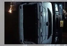 Upside-down bus accident scene in Madhya Pradesh's Rewa at night.
