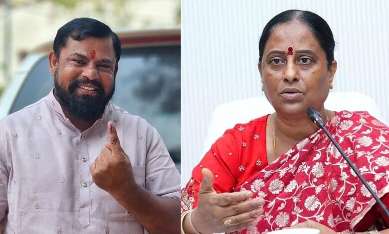 Raja Singh and Konda Surekha engaged in a discussion during a public event.