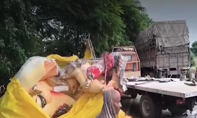 A fallen Ganesh idol affter accident in Siddipet