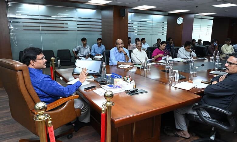 Business meeting with multiple participants in a modern conference room.