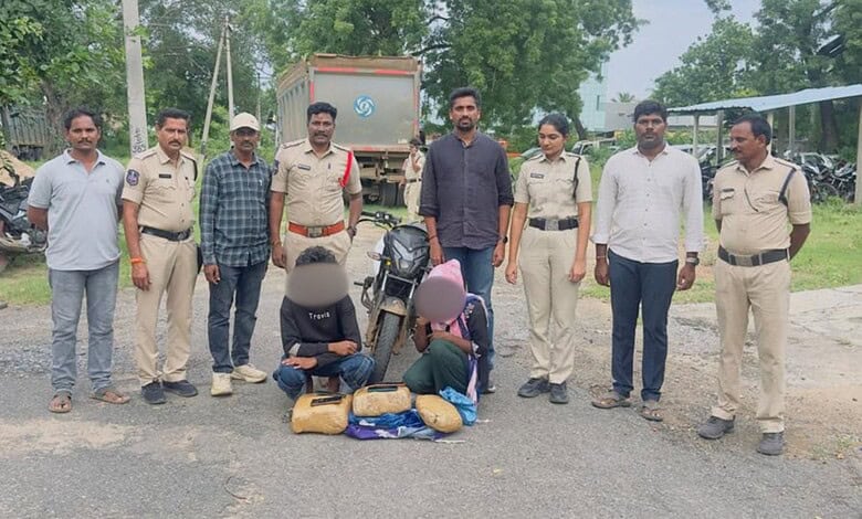 Police officers and civilians with seized items in Hyderabad, during drug bust operation.