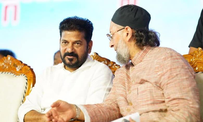 Owaisi brothers engaged in discussion at a public event in India.