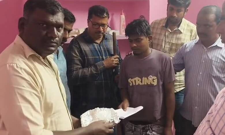 Telangana excise officials with the arrested drug peddler