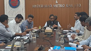 Telangana officials discuss joint Metro-RTC passes at Hyderabad Metro Rail office.