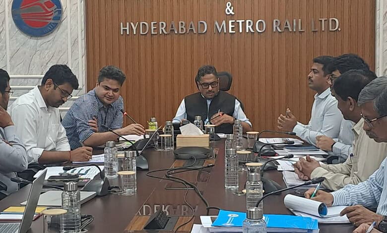 Telangana officials discuss joint Metro-RTC passes at Hyderabad Metro Rail office.