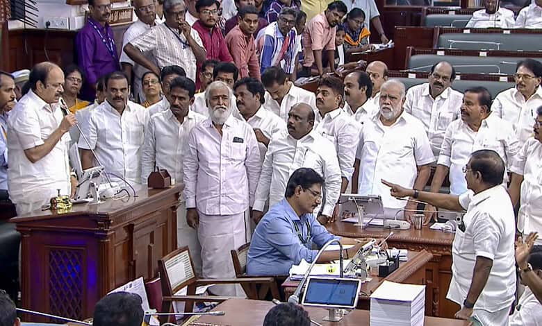 Tamil Nadu Assembly session with DMK MLAs and officials engaged in discussion.