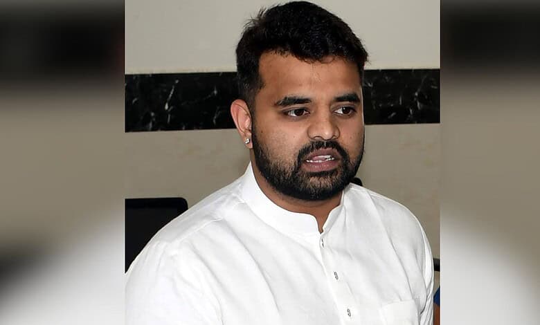 Prajwal Revanna in white kurta during police questioning at Parappana Agrahara jail.