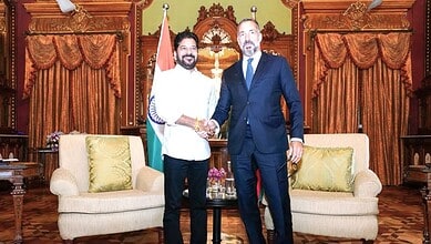 Revanth and Rahim Aga Khan shake hands during Telangana Rising Global Summit meeting.