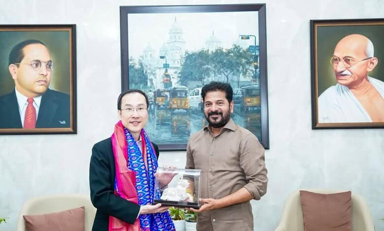 Revanth Reddy with Singapore’s Ministry of Trade and Industry Permanent Secretary Augustin Lee