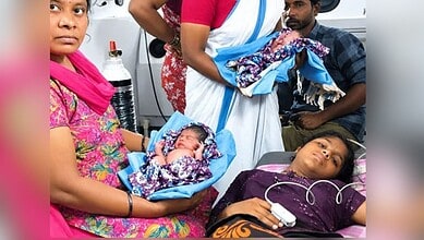 Swapna with her newborn boy